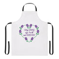 Purple and white floral apron with dog paw prints, perfect for the best dog mom