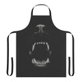 Black and white apron with a design of dog teeth, perfect for the kitchen