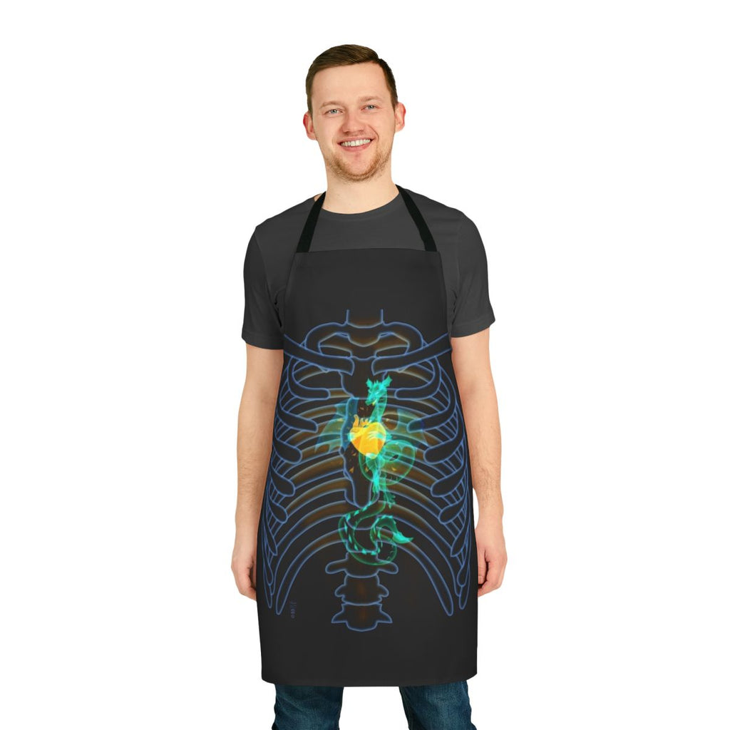 A high-quality apron featuring a dragon x-ray skeleton design with a glowing heart.