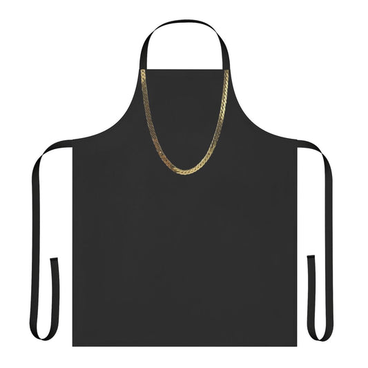 Model wearing a gold chain apron in the kitchen