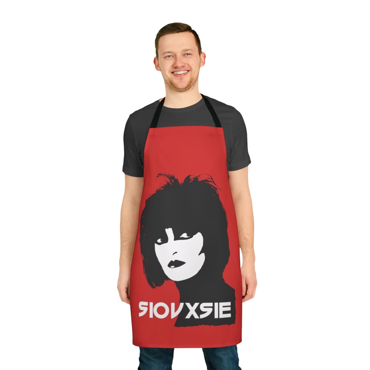 A black and white apron with a striking Siouxsie Sioux-inspired design, perfect for music lovers and fans of post-punk style.