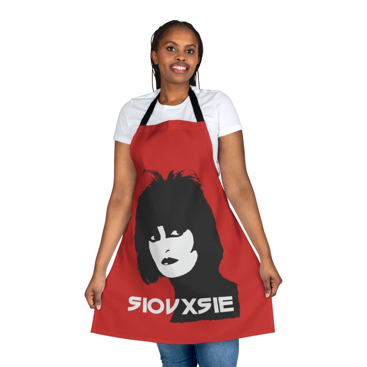 A black and white apron with a striking Siouxsie Sioux-inspired design, perfect for music lovers and fans of post-punk style.
