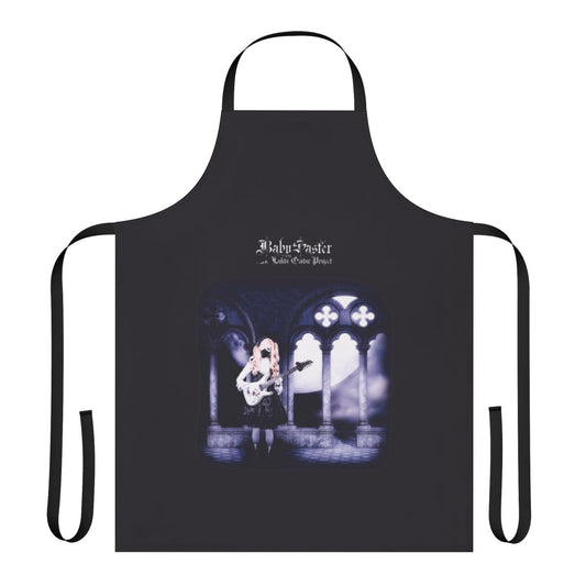 A model wearing a custom gothic lolita-style apron, featuring a toccata guitar design.