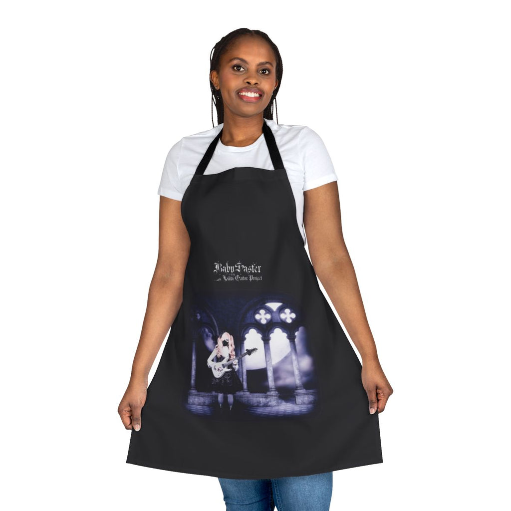 A model wearing a custom gothic lolita-style apron, featuring a toccata guitar design.