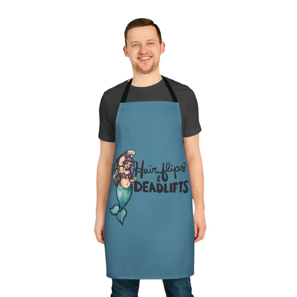 A black apron with the text "Hair Flips and Deadlifts" and a mermaid graphic, perfect for weightlifting and fitness fans.