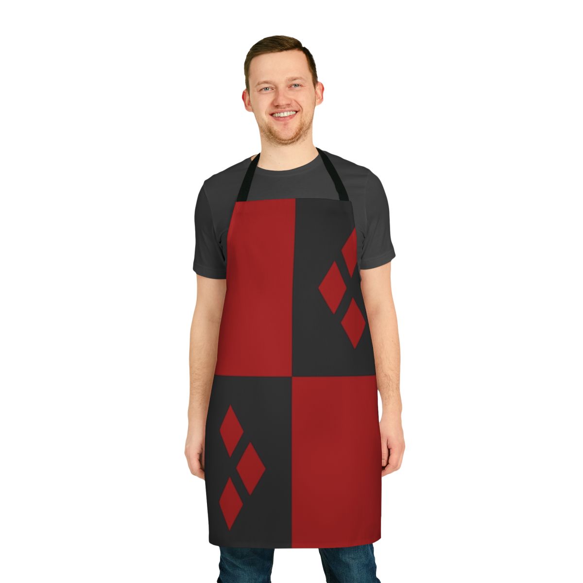 A vibrant, diamond-print apron in red and black, perfect for Harley Quinn fans and cosplayers.