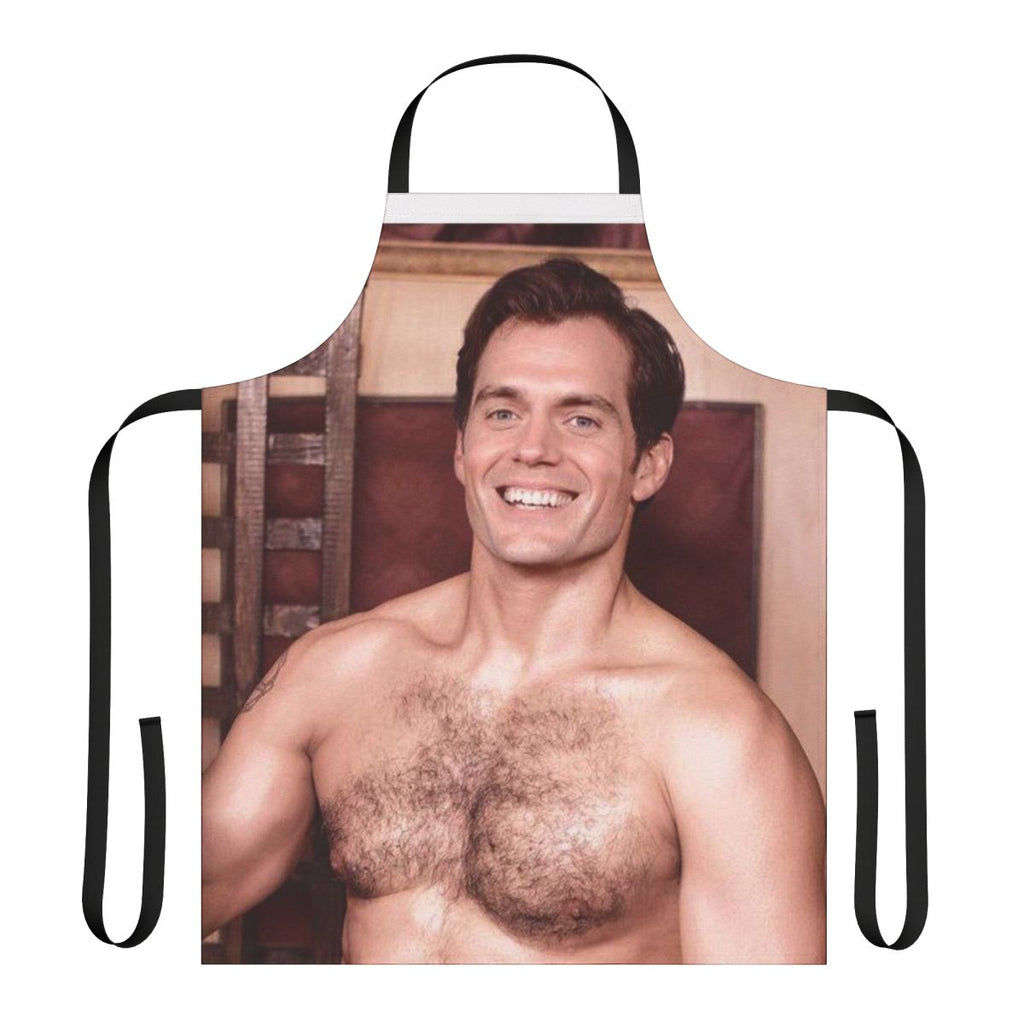 Attractive photo of Henry Cavill wearing a cooking apron