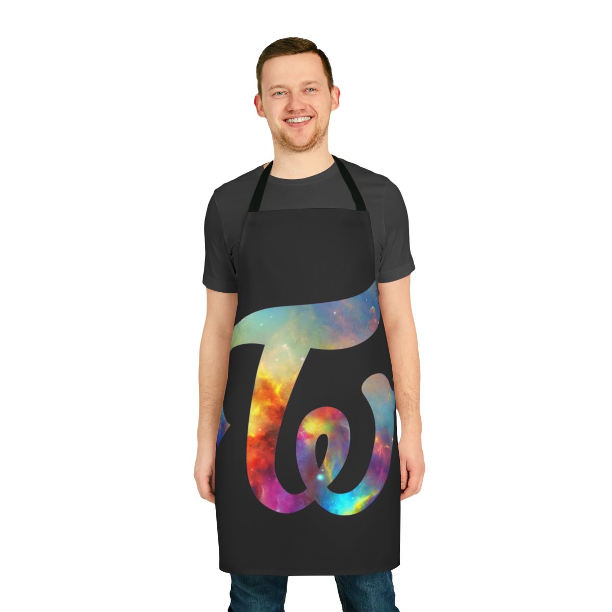 A black apron with a nebula and four circular designs, inspired by Kpop group Twice.