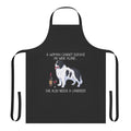Landseer dog wearing a funny apron with a wine glass design