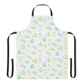 Vibrant lizard print apron with adjustable neck and waist ties for comfortable, eco-friendly cooking and gardening.