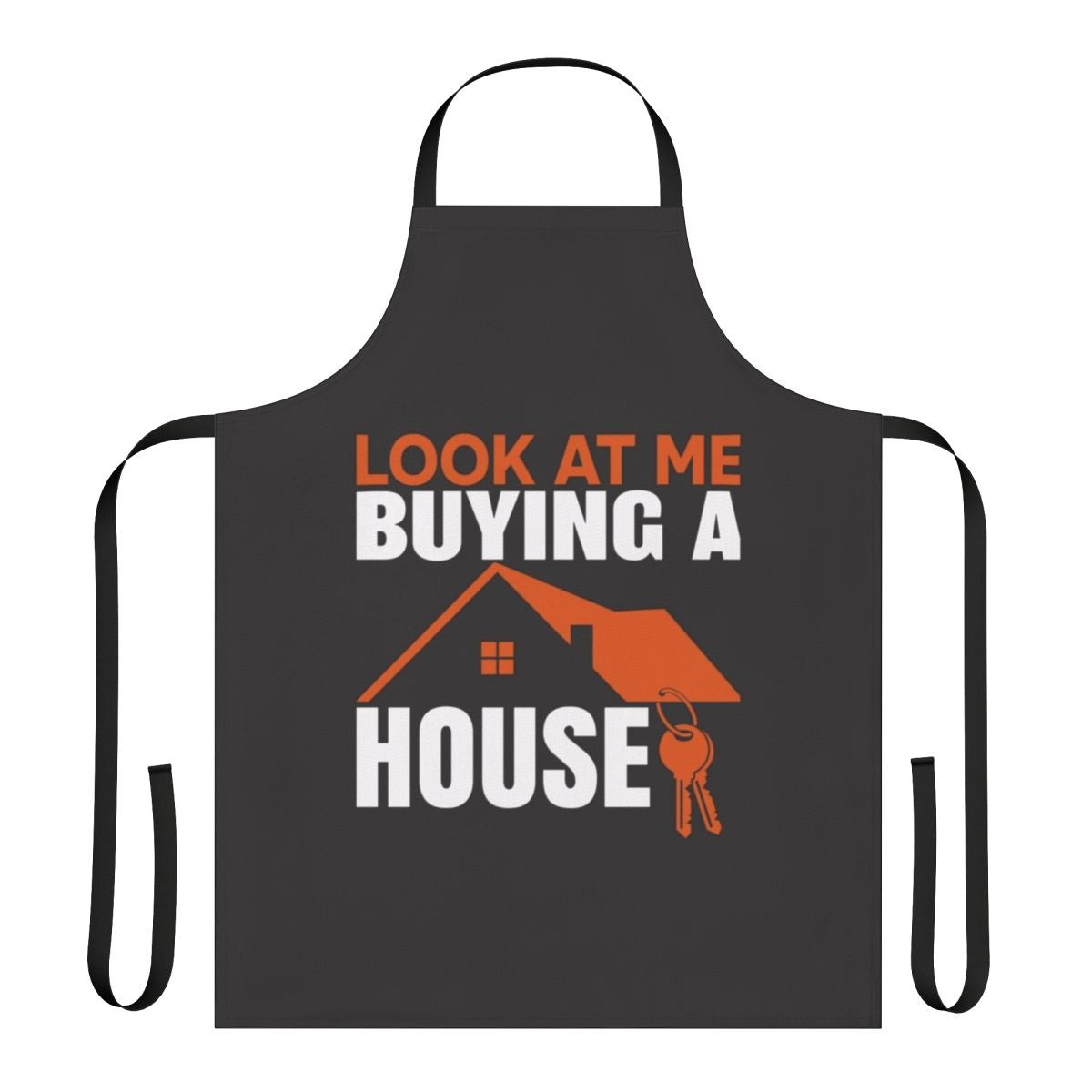 Man wearing a "Look at Me Buying a House" themed apron in his kitchen
