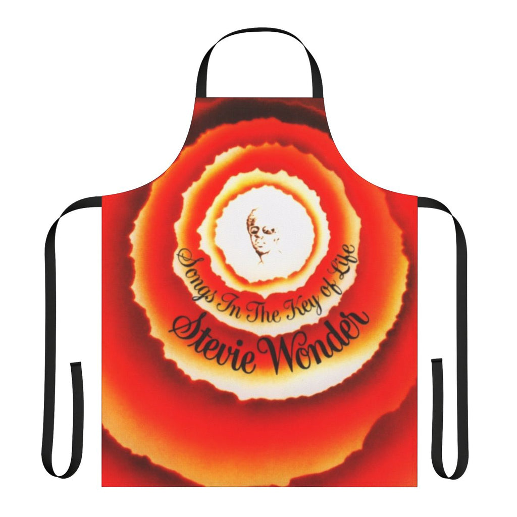 Apron with colorful design featuring Stevie Wonder's "Songs in the Key of Life" album cover