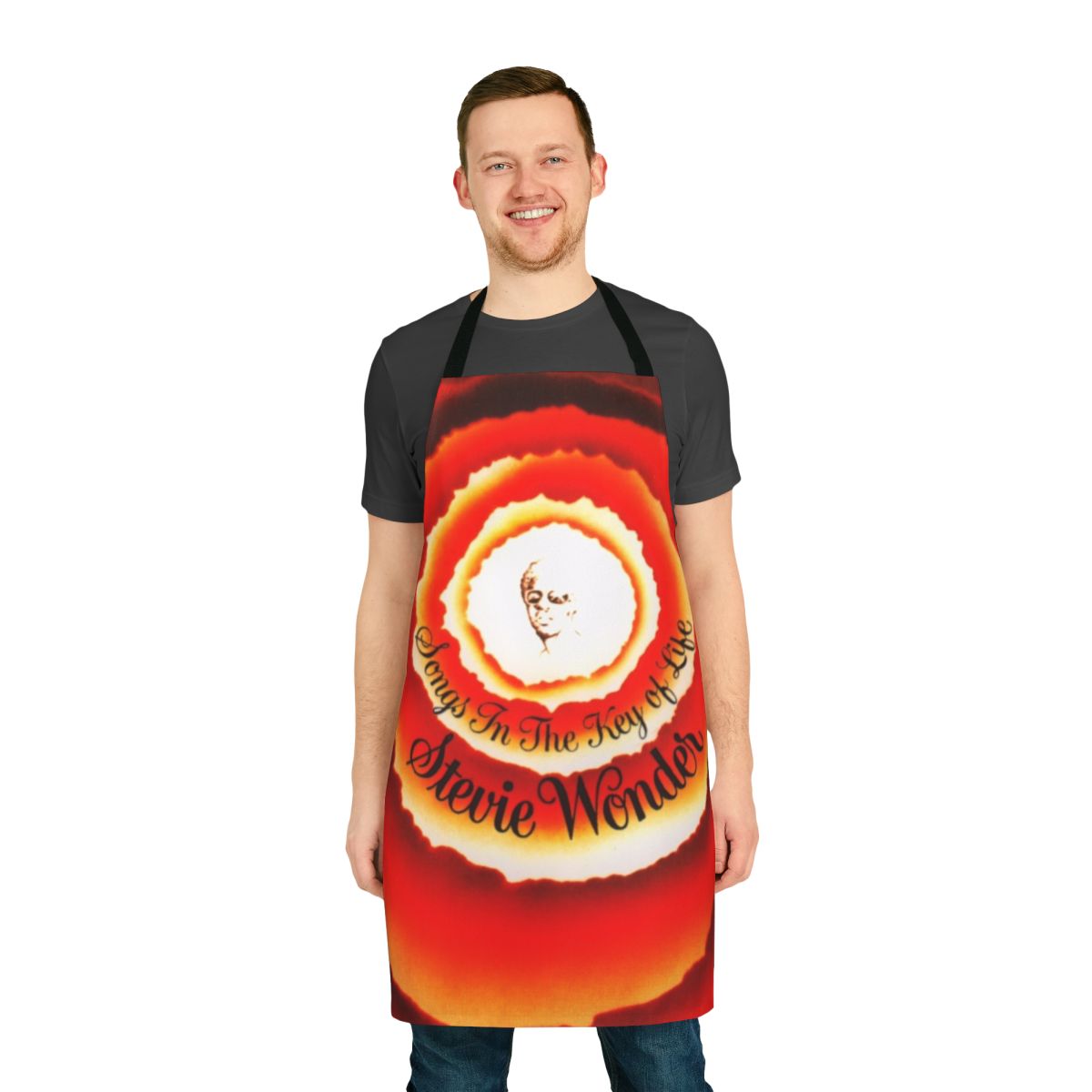 Apron with colorful design featuring Stevie Wonder's "Songs in the Key of Life" album cover