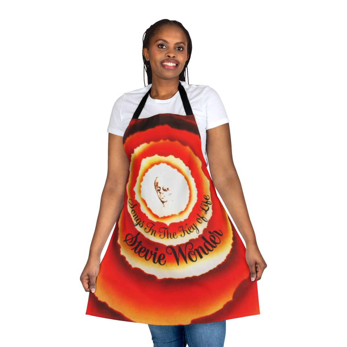 Apron with colorful design featuring Stevie Wonder's "Songs in the Key of Life" album cover