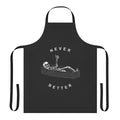 A black apron with a skeleton and the text "Never Better" in white