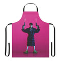 Pink apron with the text "Guns Akimbo" and a gun graphic, inspired by the movie starring Daniel Radcliffe.