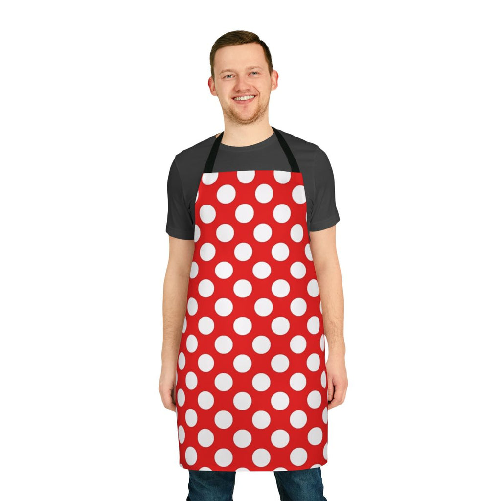 A red and white polka dot patterned apron