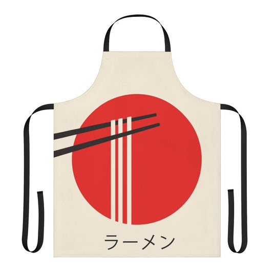 A vibrant, retro-style apron featuring a ramen bowl and kaiju monster design