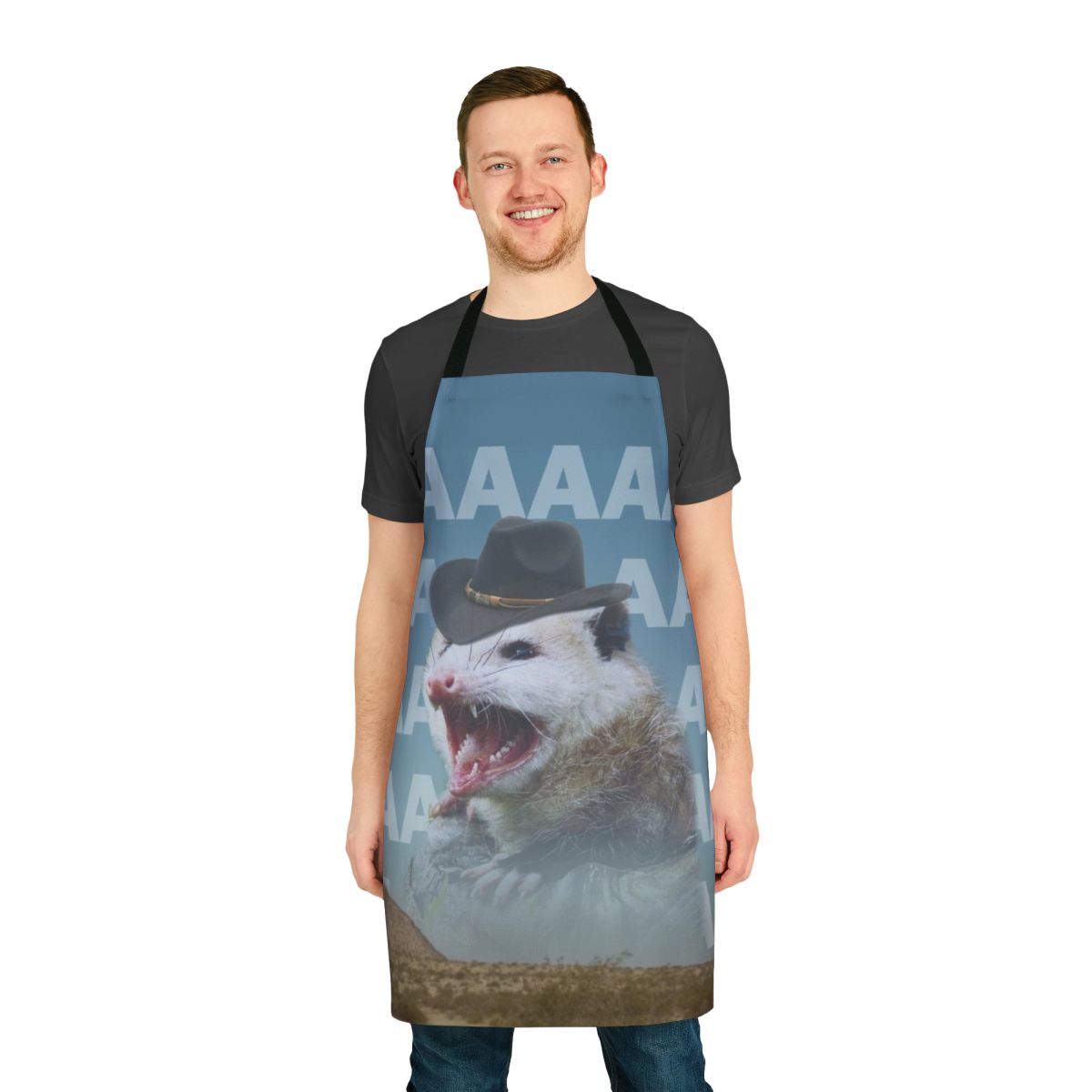 A vibrant apron featuring a screaming cowboy possum design