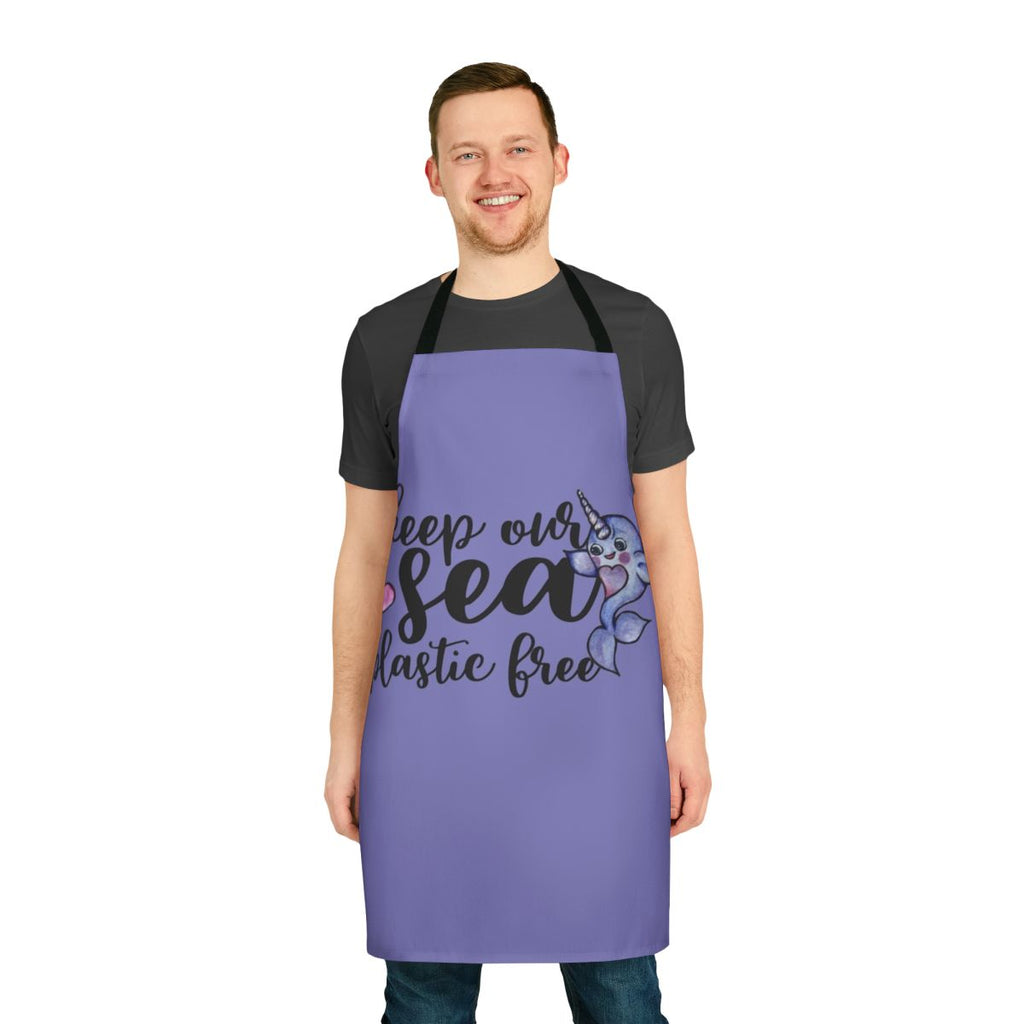 Narwhal-patterned apron in shades of blue, promoting a plastic-free ocean