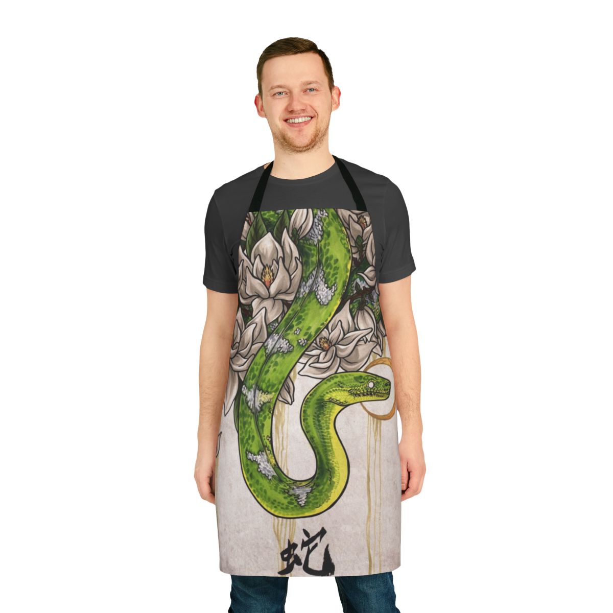 Detailed snake and magnolia flower design on a high-quality kitchen apron