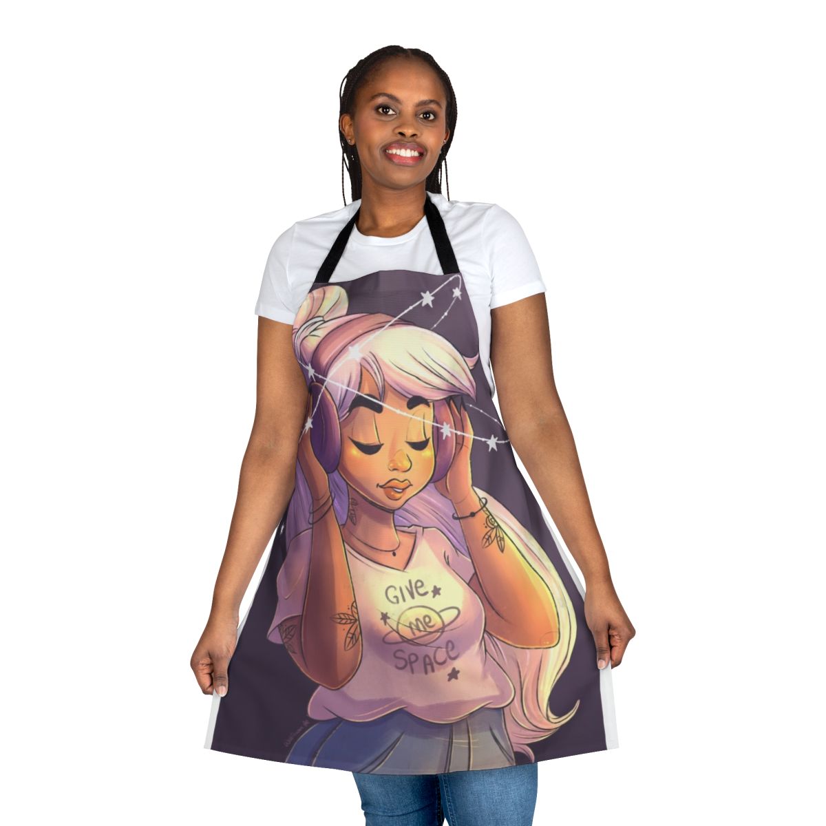 Image of a woman wearing a space-themed apron with stars, galaxies, and an astronaut design