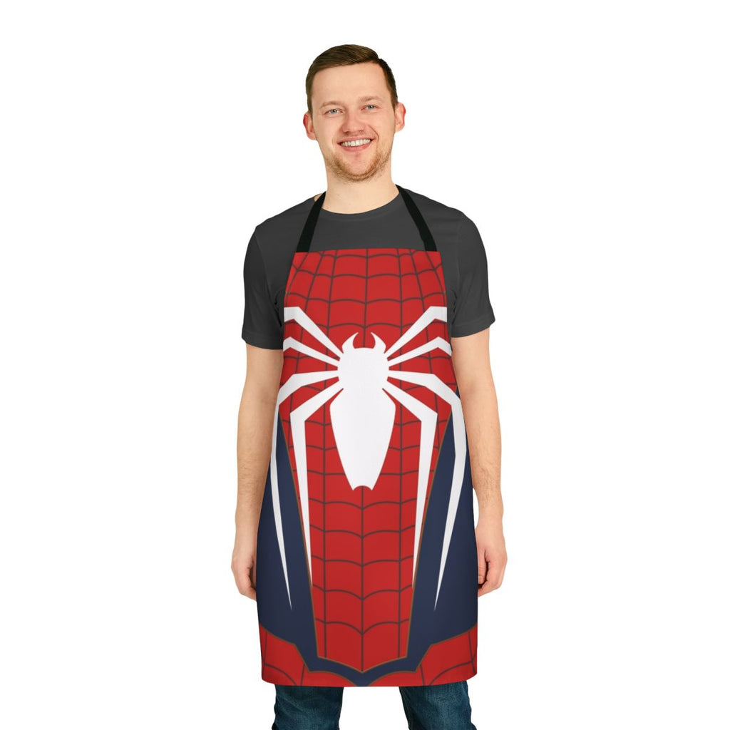 A white apron with a spiderweb design, perfect for the superhero-inspired home cook.