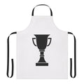 Person wearing a champion trophy-inspired apron while cooking or baking