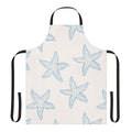 Person wearing a vibrant summer-themed apron while cooking or gardening