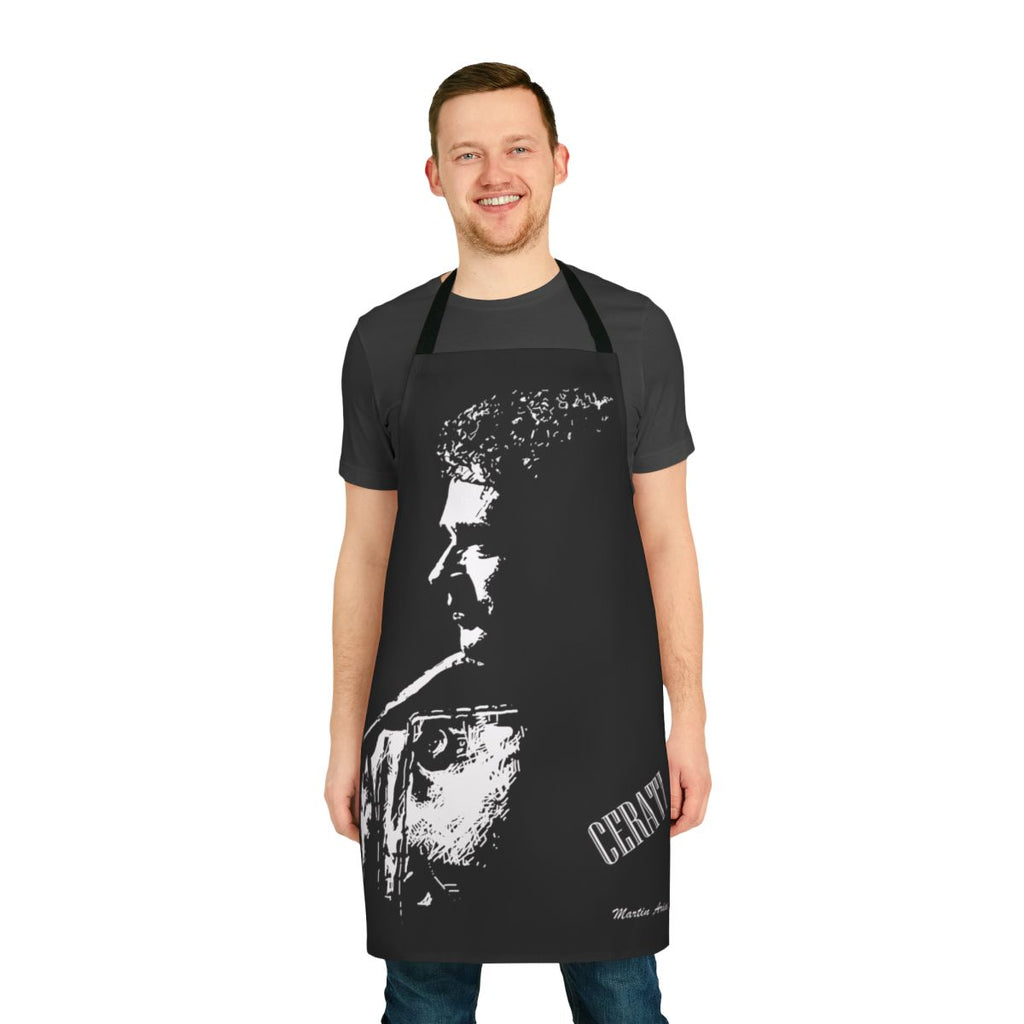 A white and black apron featuring a sun rising over a city skyline design.