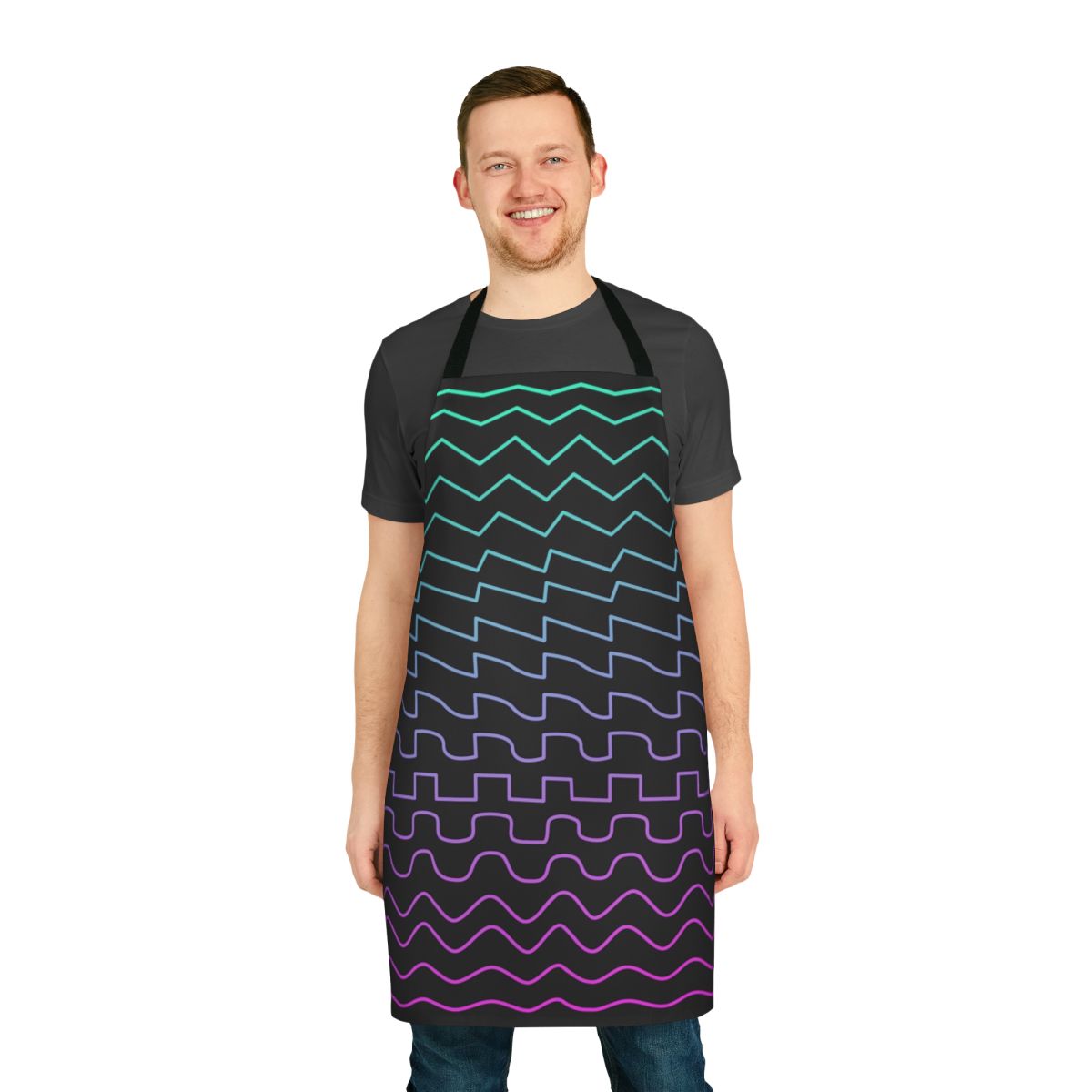 Apron with printed synthesizer waveform designs - sine, triangle, square, and sawtooth patterns.