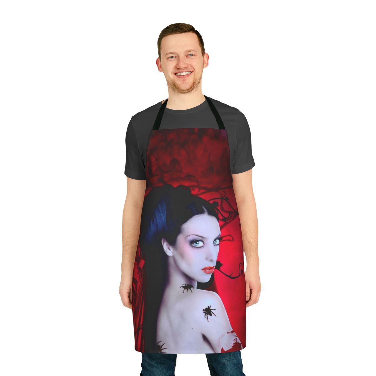 Vibrant orange tarantula-patterned apron featuring pop singer Monica Naranjo