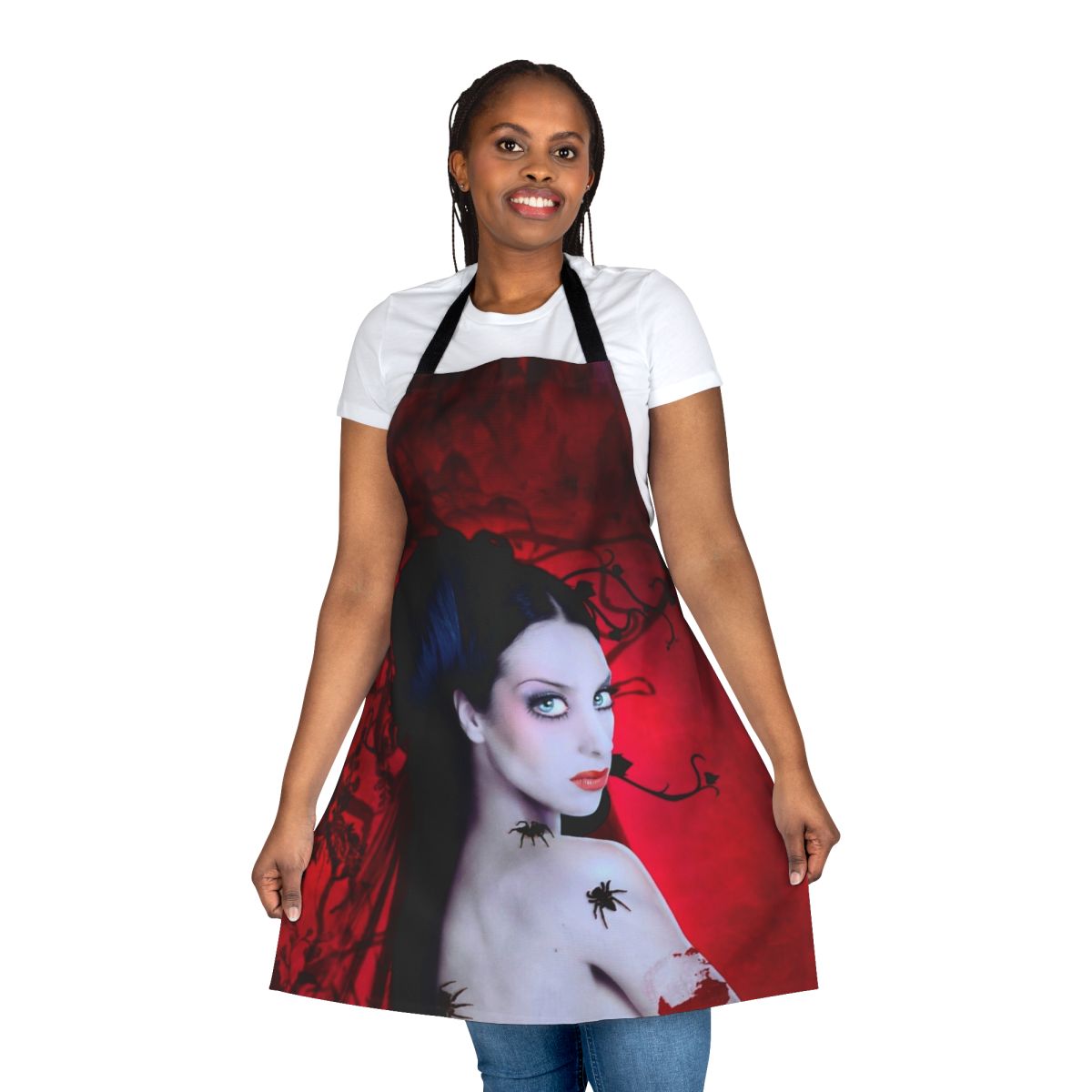 Vibrant orange tarantula-patterned apron featuring pop singer Monica Naranjo
