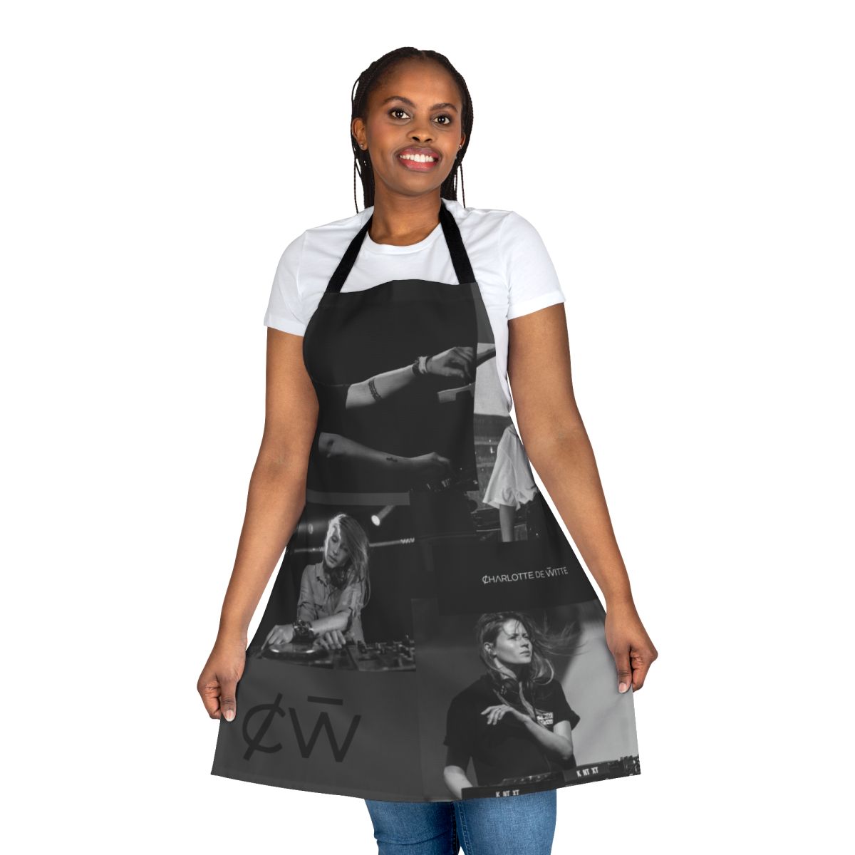 Sleek black and white apron featuring the name "Charlotte De Witte", a prominent female techno DJ