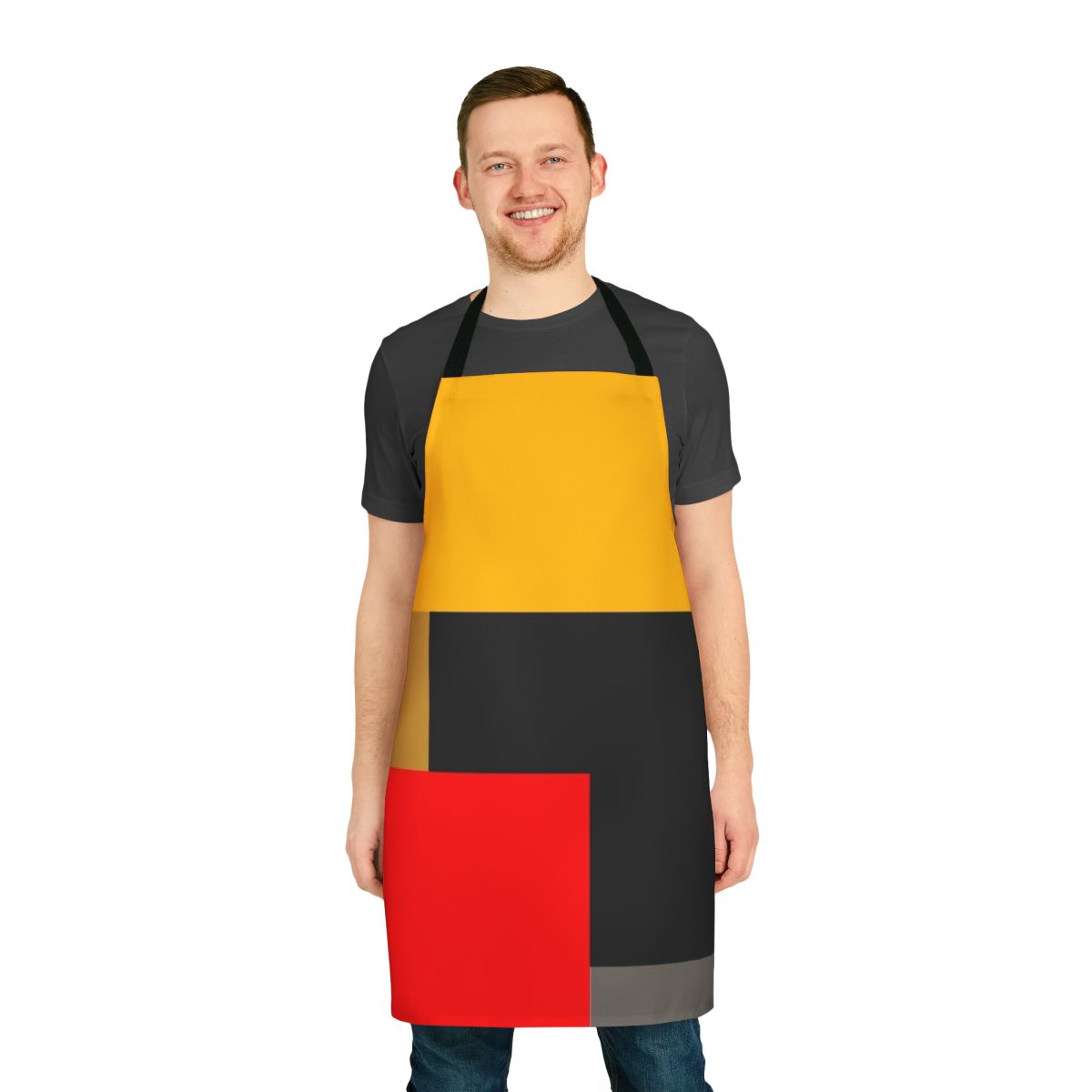 A stylish warm apron featuring a geometric abstract design in yellow, blue, red, white, and gray.