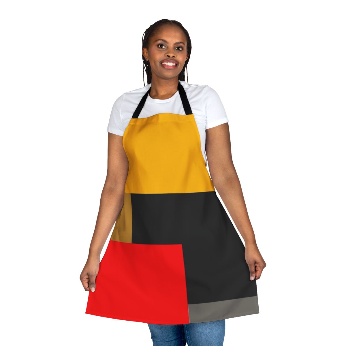 A stylish warm apron featuring a geometric abstract design in yellow, blue, red, white, and gray.