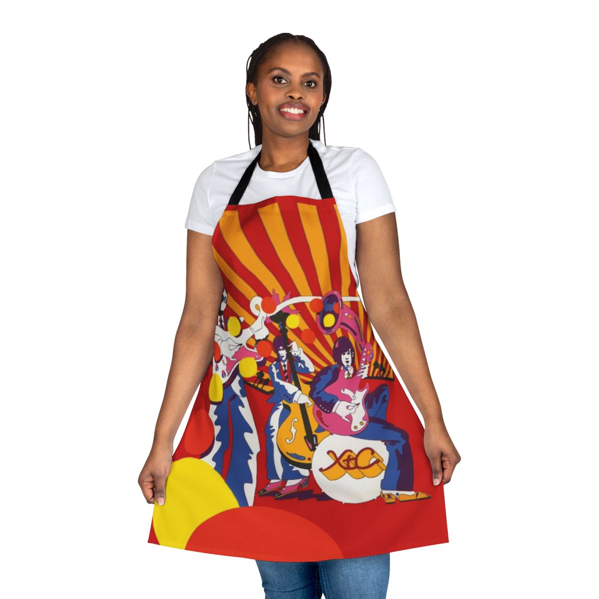 Man wearing a stylish XTC apron while cooking in the kitchen