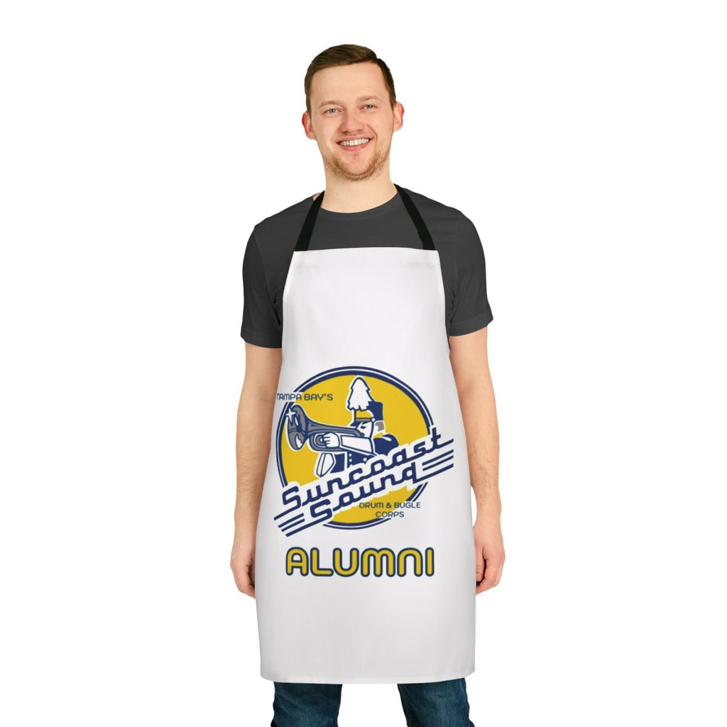 Suncoast Sound inspired marching band alumni wearing an apron