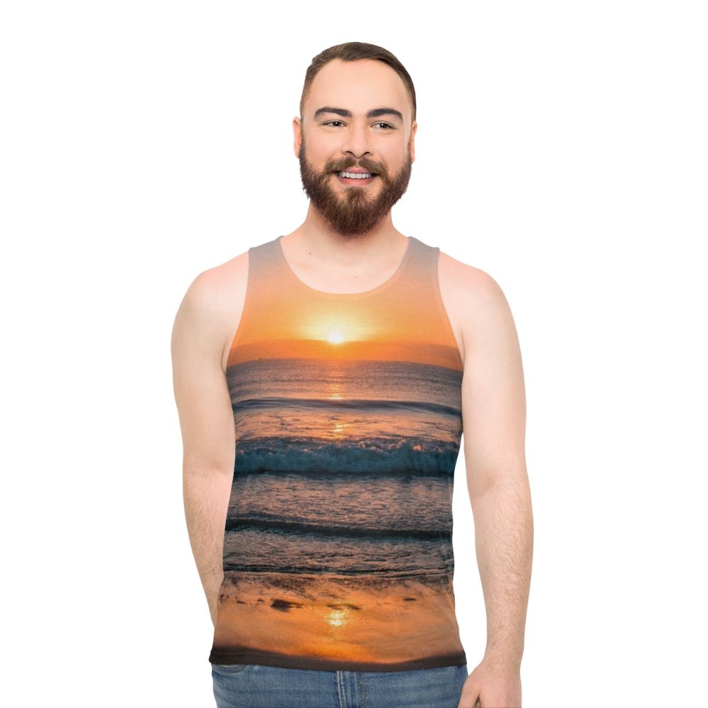 Sunset over the beach unisex tank top