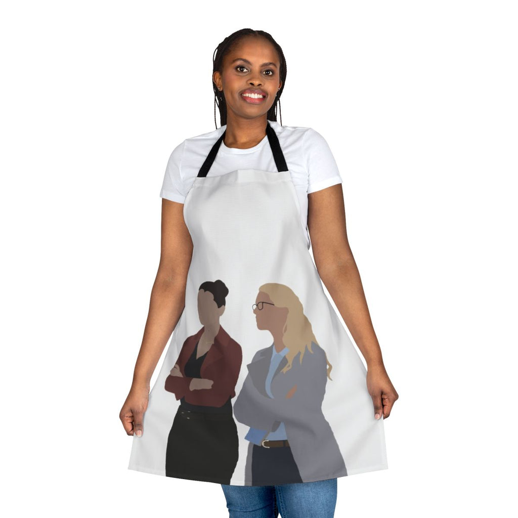 Supergirl-themed apron featuring Kara Danvers and Lena Luthor