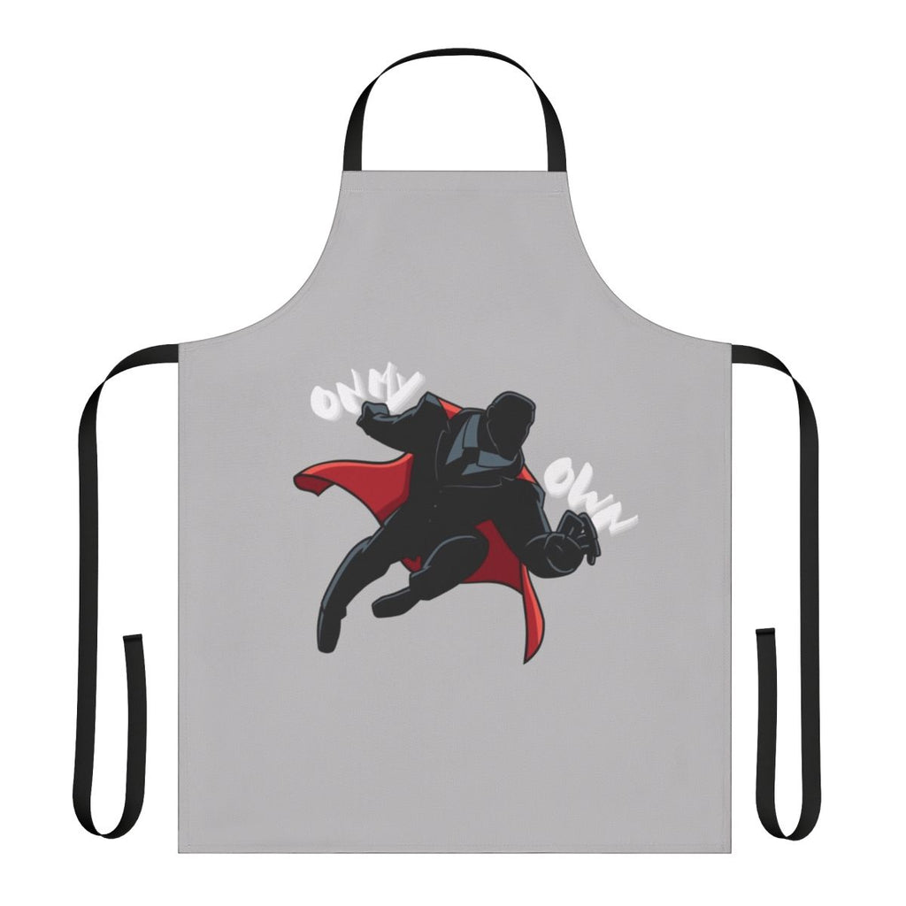 A black and red apron with a superhero-inspired graphic, representing the Y2K era's bold fashion.