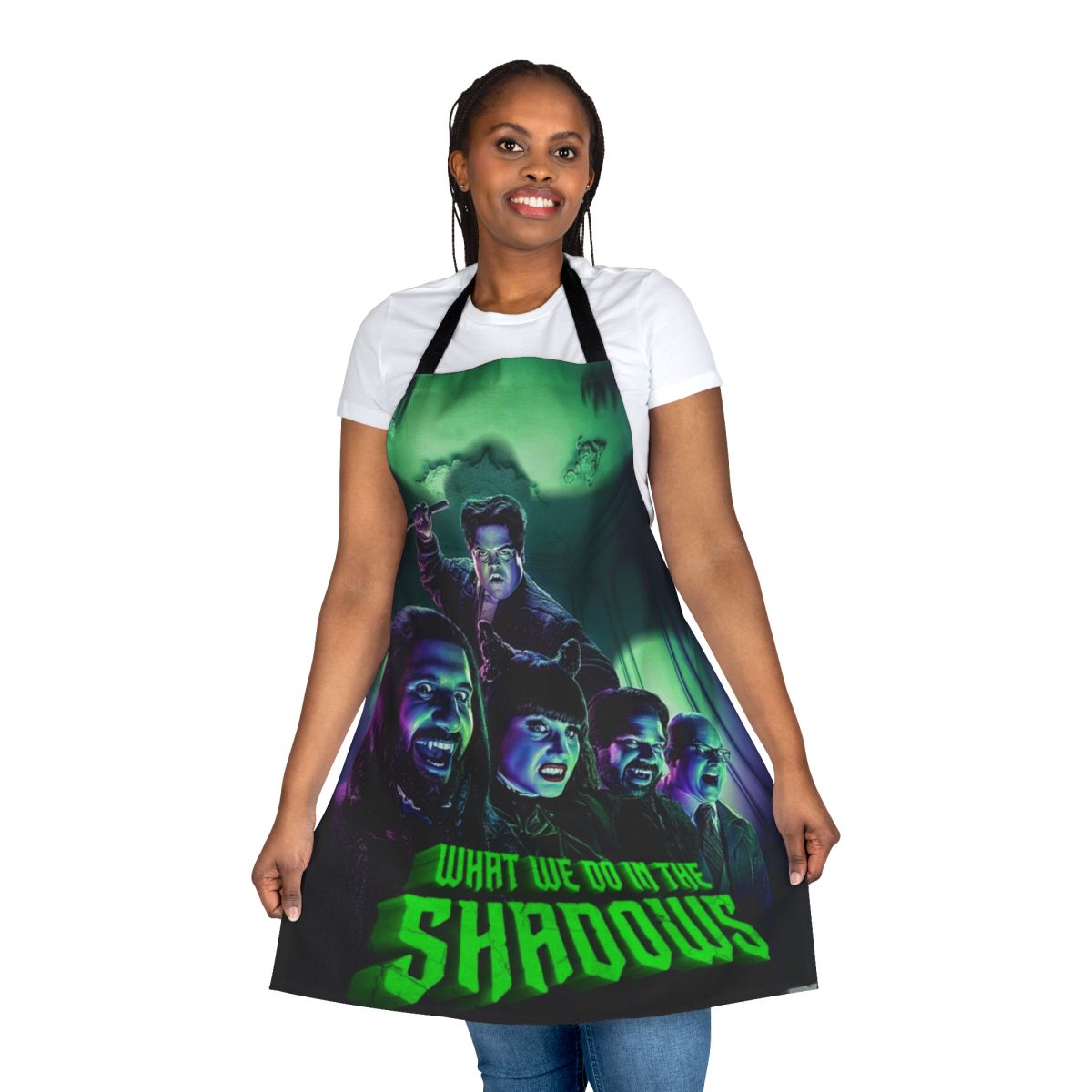 A black apron featuring the characters from the TV show "What We Do in the Shadows"