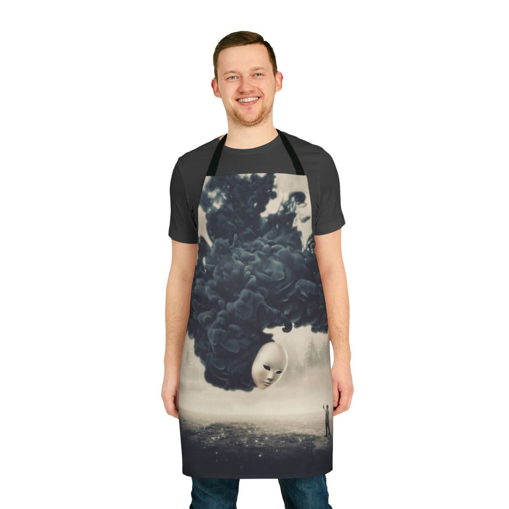 A dark, surreal apron featuring a spooky, dreamlike landscape and a floating cell phone taking a "selfie"
