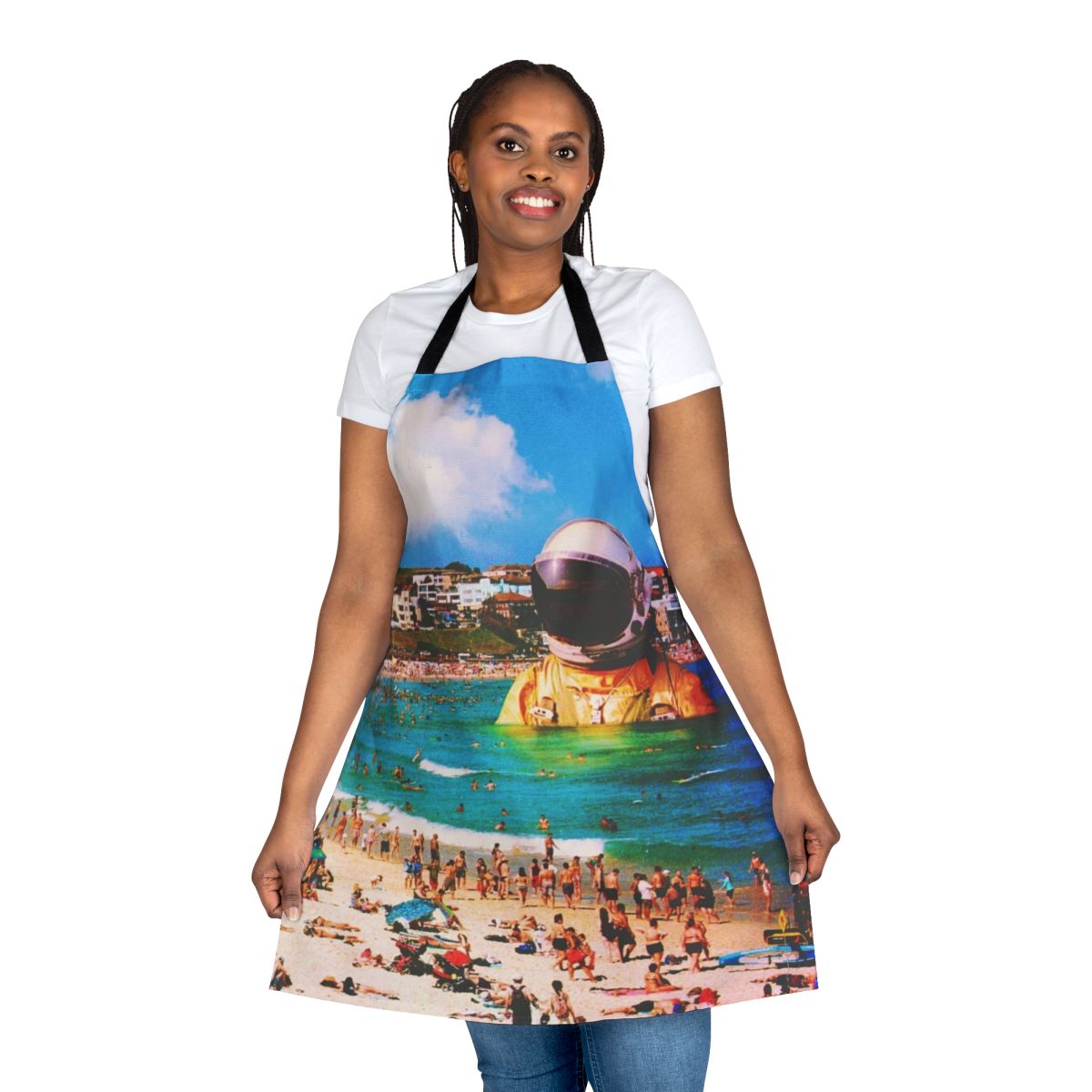 Surreal digital art collage of a beach astronaut, featured on an apron product.