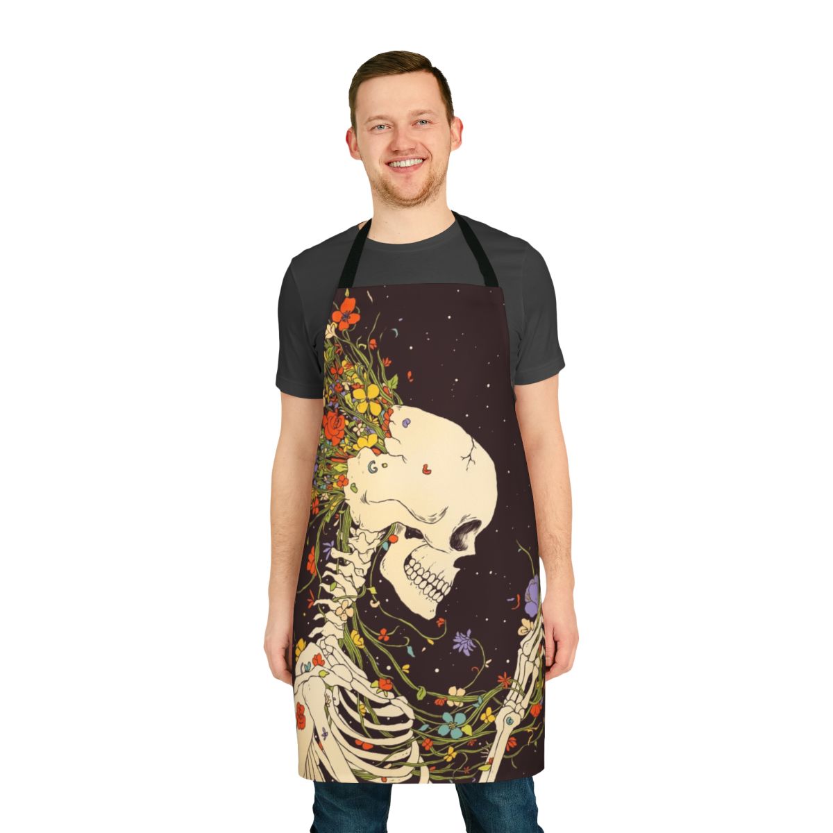 Surreal apron featuring a skull and flower design against a starry night sky background