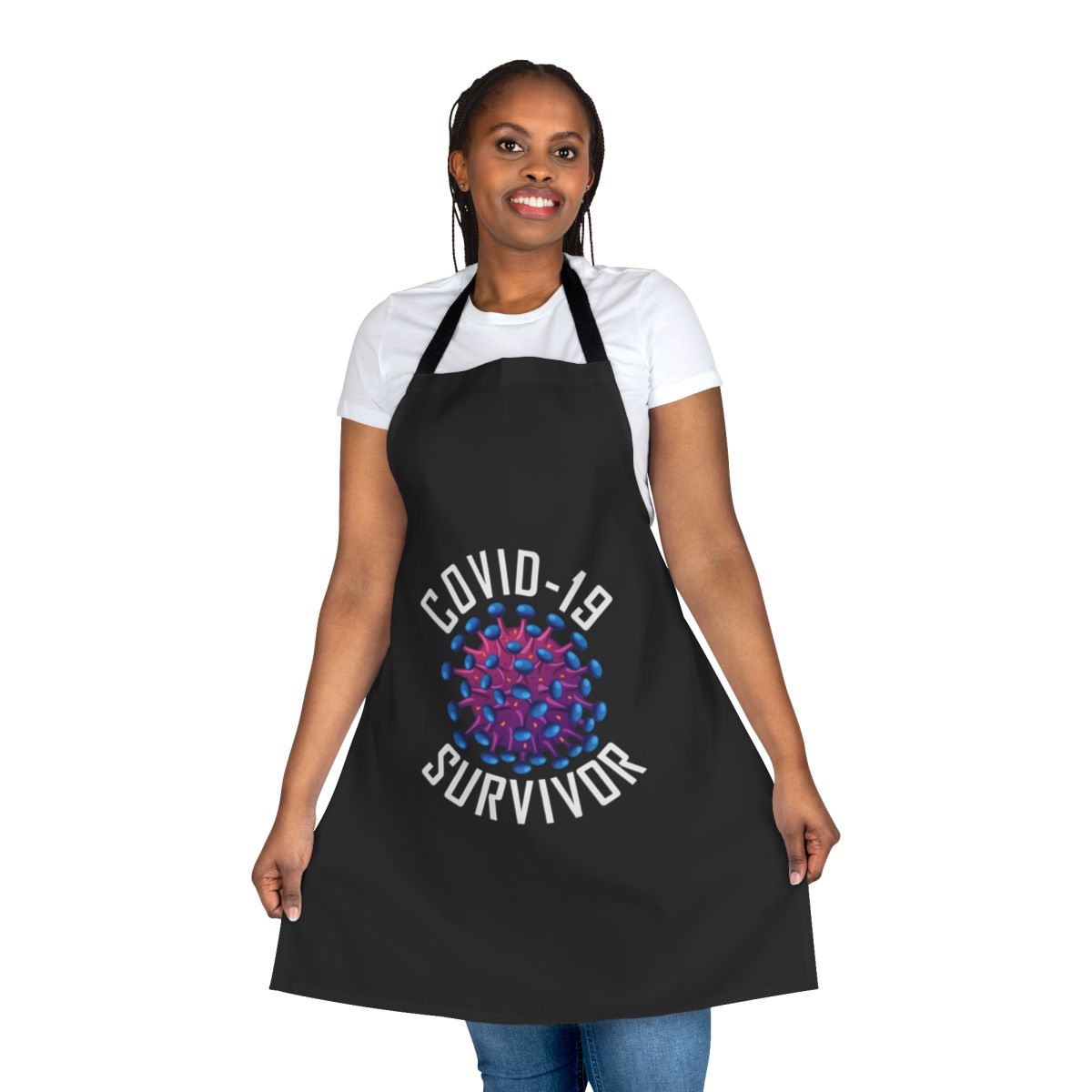 COVID-19 survivor wearing a survivor tee apron