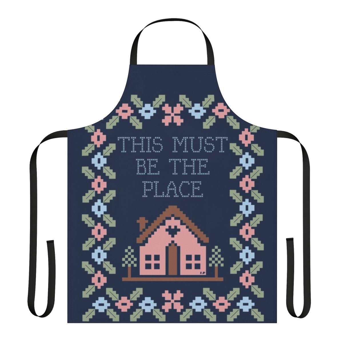 A stylish and high-quality kitchen apron featuring a graphic design inspired by the iconic Talking Heads song "This Must Be the Place".