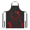 A red and black apron featuring horror movie elements like a chainsaw, blood, and the word "Abomination"