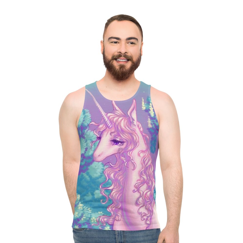 Unisex tank top featuring a glowing unicorn design in a forest setting from the classic 80s fantasy movie 'The Last Unicorn'