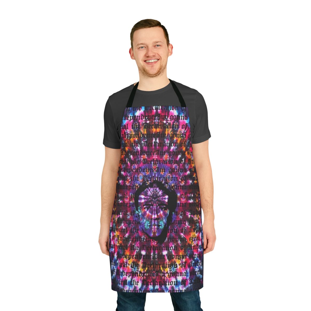 Tie dye apron with a third eye design, inspired by Nicolas Cage's iconic roles and the Shambhala music festival in British Columbia.